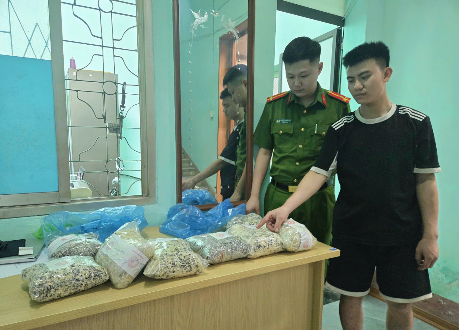 Nguyễn Văn Tứ tại cơ quan Công an.
