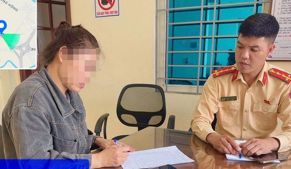 CSGT làm việc với nữ tài xế để trẻ nhỏ ngồi trước vô lăng ô tô đang chạy - 1